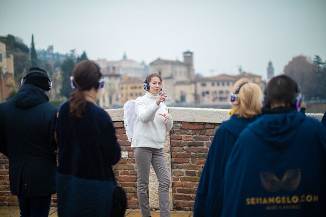 Guided Tour in the Center of Verona Accompanied by an Angel - Immersive Performance Elements