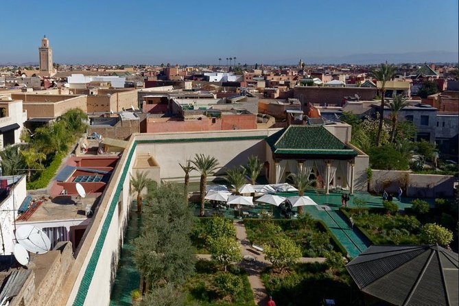 Guided Tour: Secret Garden and the Great Souk of Marrakech. - Navigating the Great Souk