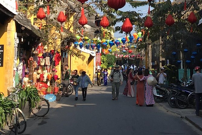 Guided Tour to Marble Mountains & Hoi An Walking Tour , Night Market, Boat Ride - Lantern-lit Night Market Shopping