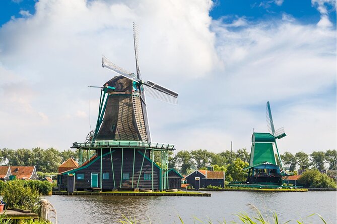 Guided Tour to Zaanse Schans, Volendam and Maken With Boat Ride - Key Points