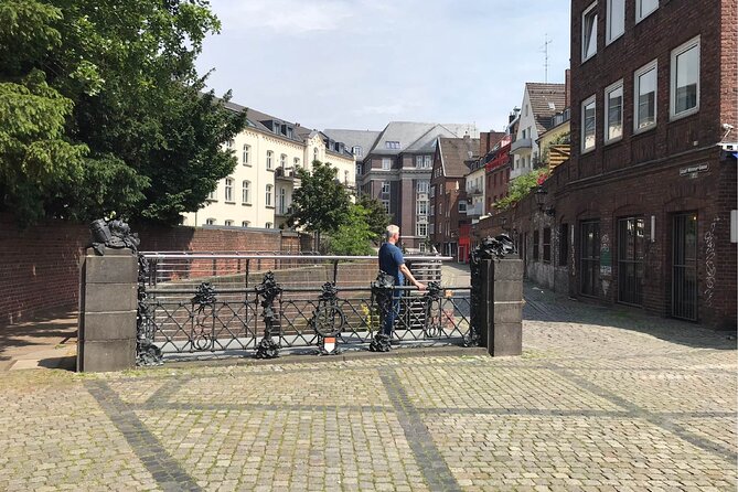 Guided Walking Tour in Dusseldorf - Guide Highlights and Expertise