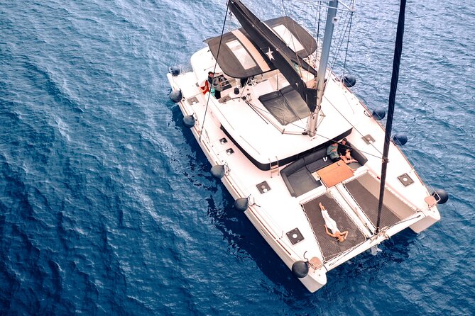 Half Day Premium Catamaran Cruise in Santorini Including Oia - Inclusions and Amenities