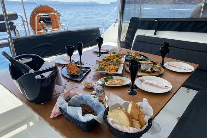 Half Day Premium Catamaran Cruise in Santorini Including Oia - Tour Details and Experience