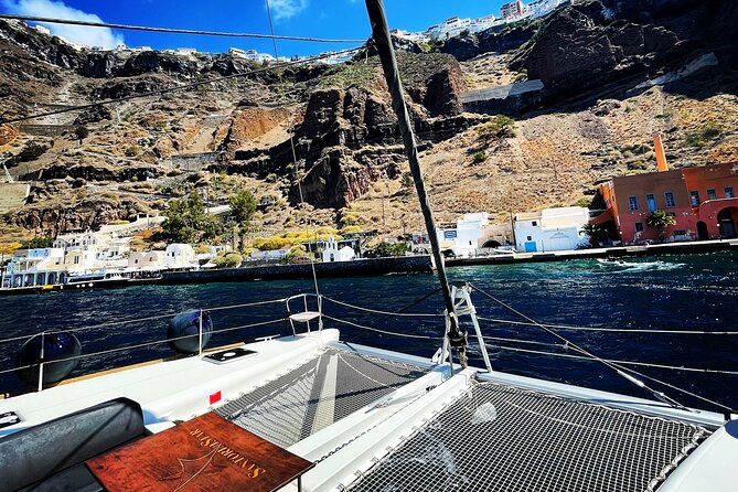 Half Day Premium Catamaran Cruise in Santorini Including Oia - Meeting and Pickup Options