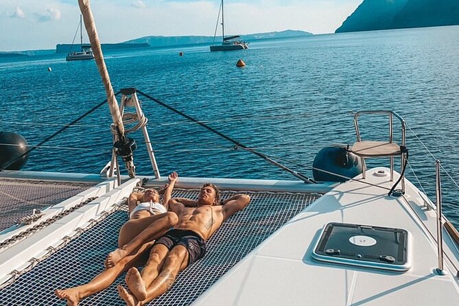 Half Day Premium Catamaran Cruise in Santorini Including Oia - Cancellation and Refund Policy