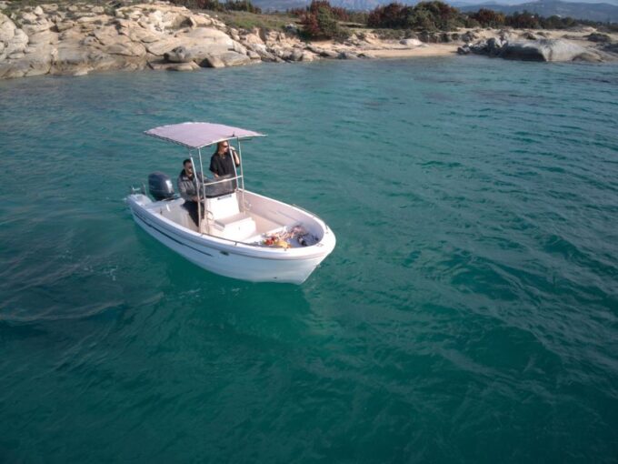 HALF-DAY PRIVATE TOUR WITH BOAT TO KOUTSOMITI, KOUNOUPA, AND THE RED ROCK - Experience Overview