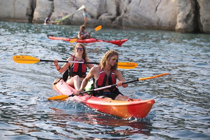 Half-Day Split Sea Kayak Adventure - Swimming and Cliff Jumping