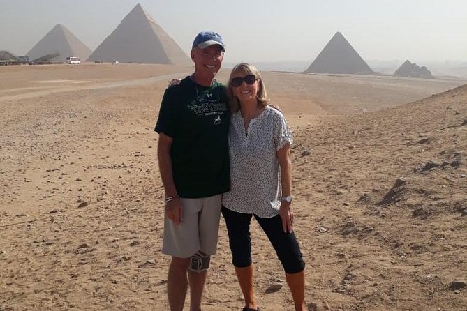 Half-Day Tour of the Giza Pyramids and Solar Boat Museum With Lunch and Camel Ride - Key Attractions