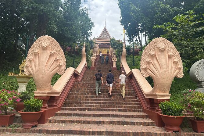 Half Day Tour to Royal Palace, Wat Phnom & Independent Monument - Khmer Empire Artifacts