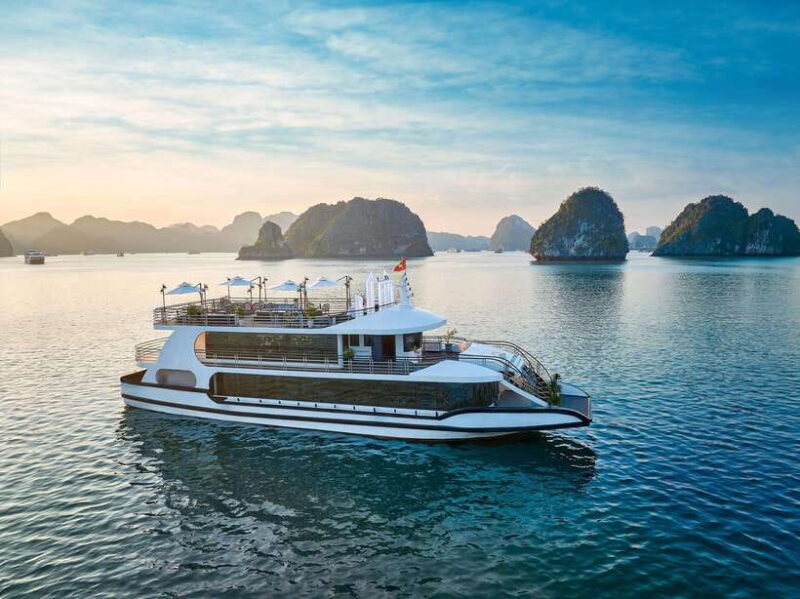 Halong Bay: Luxury Day Cruise With Buffet, Kayak, Swim - Surprising Cave: Exploring Stalagmites and Stalactites
