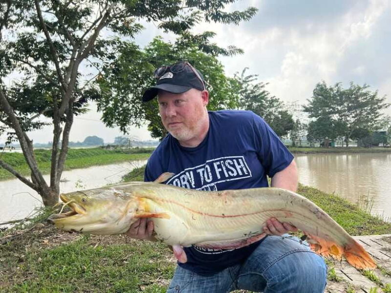 Hanoi: Catfish Luring Experience With Round-Trip Transfer - Catching and Handling the Catfish