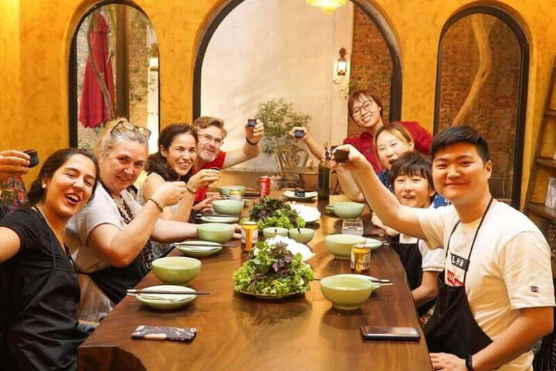 Hanoi: Cooking Class With Market Tour and Hotel Pickup - Guided Cooking Experience