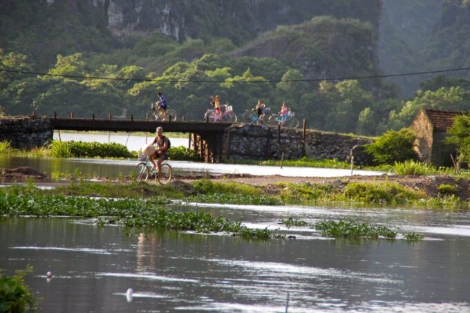 Hanoi: Full Day Guided Tour of Hoa Lu, Tam Coc, and Mua Cave - Limousine Bus Transportation