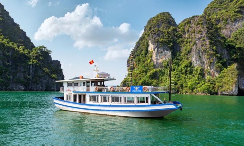 Hanoi: Halong Bay Day Trip With Titop Island, Cave, & Kayak - Kayaking and Rowing