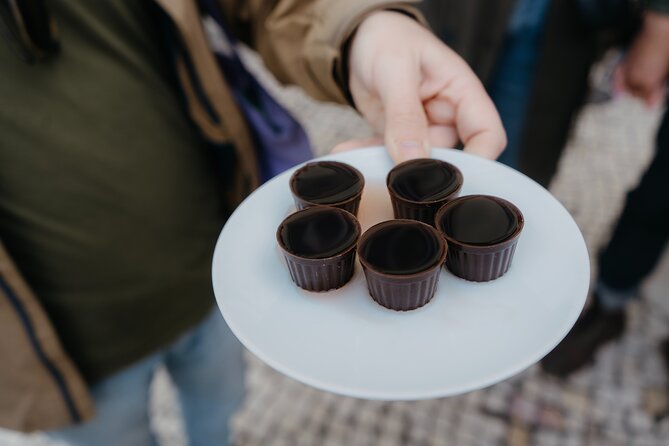Heart of Lisbon Food Tour: Baixa, Chiado & Bairro Alto - Indulging in Ginjinha in a Chocolate Cup