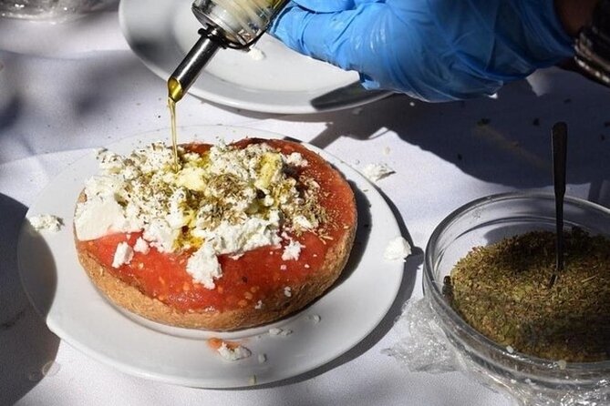 Heraklion: Cretan Private Cooking Lesson With Lunch in Arolithos - Sampling the Cretan Menu
