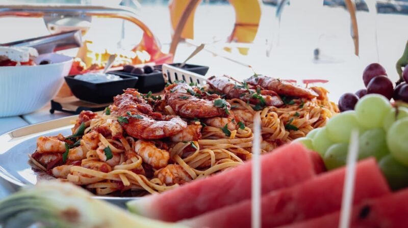 Heraklion: Dia Island Small Group Catamaran Cruise With Meal - Pricing and Booking Details