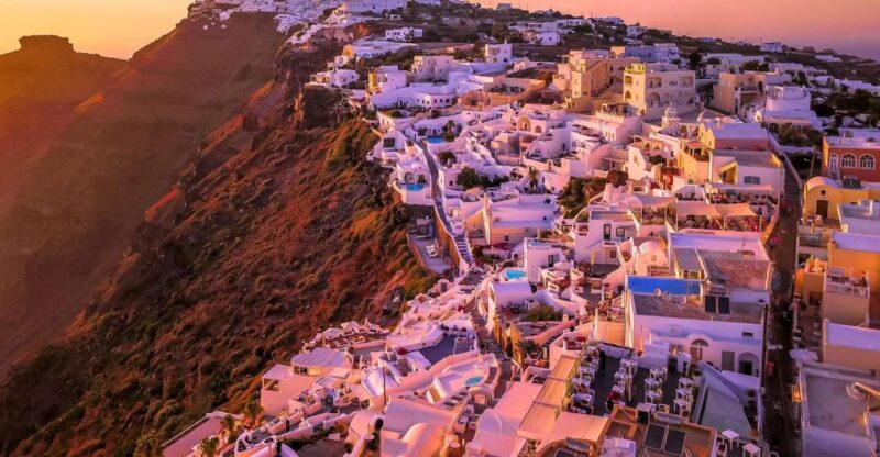 Heraklion: Santorini Day Trip With Boat Transfer & Oia Visit - Guided Tour Highlights