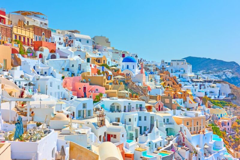 Heraklion: Santorini Day Trip With Boat Transfer & Oia Visit - Santorinis Caldera Experience