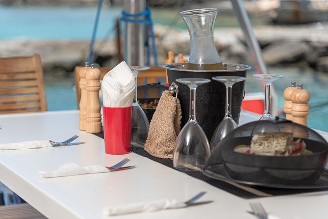 Hersonissos Sunset Catamaran Cruise With Finger Food & Drinks - Group Size and Inclusions