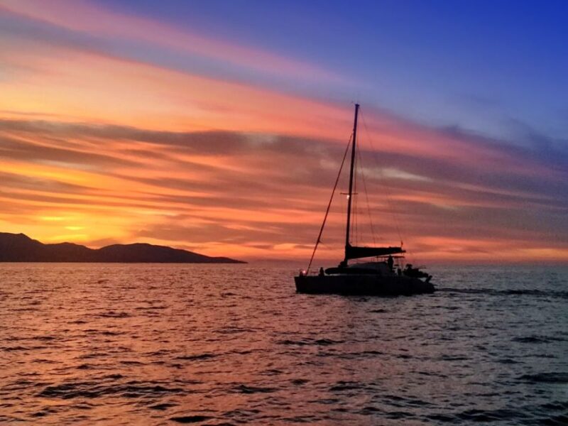 Hersonissos: Sunset Catamaran Trip With Finger Food & Drinks - Sunset Views and Scenic Sailing