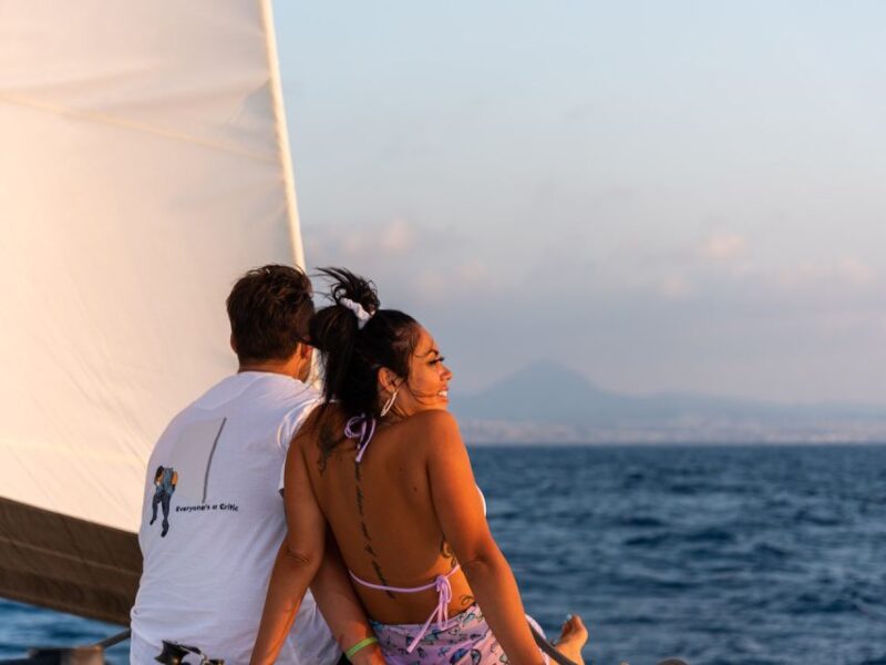 Hersonissos: Sunset Catamaran Trip With Finger Food & Drinks - Swimming and Snorkeling in Agios Georgios Bay