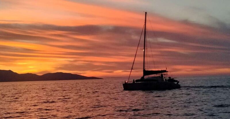Hersonissos: Sunset Private Catamaran to St George Bay - Key Points