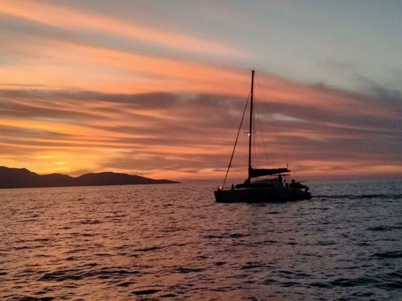 Hersonissos: Sunset Private Catamaran to St George Bay - Included Experiences