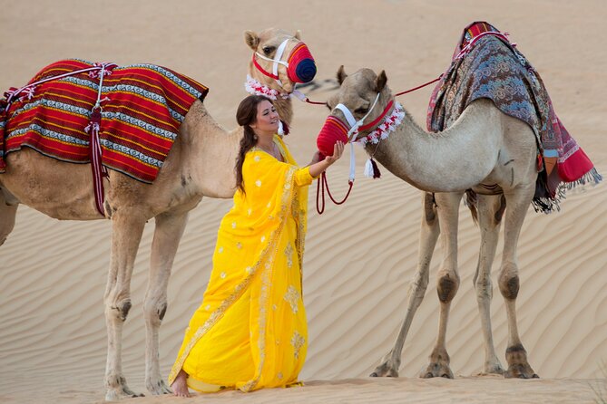 High Red Dunes With Camel Ride, Sandboarding, Falcon Show and VIP BBQ Dinner - Booking and Cancellation Policy