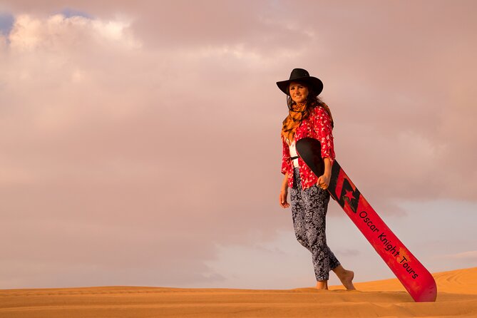 High Red Dunes With Camel Ride, Sandboarding, Falcon Show and VIP BBQ Dinner - Red Dune Bashing and Sandboarding