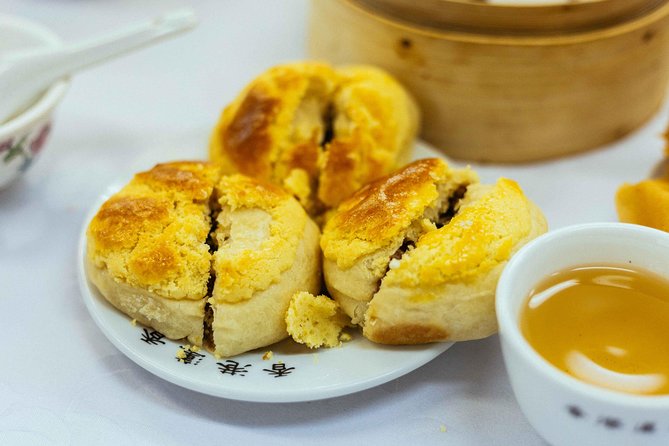 Highlights & Hidden Gems With Locals: Best of Hong Kong Private Tour - Pineapple Bun and Milk Tea