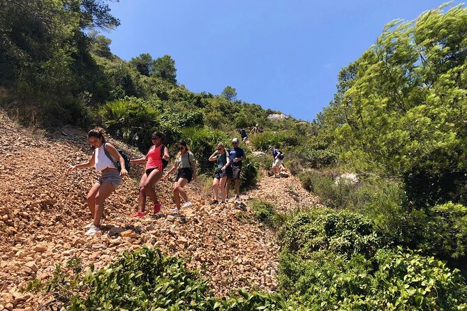 Hiking Cliffs and Old Fishing Trails Around Moraira - Refreshing Swimming Break