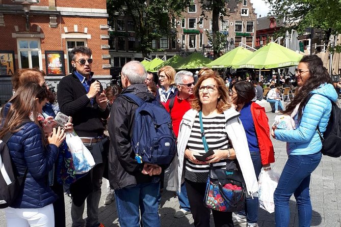 Historical Tour of Amsterdam With Italian Guide - Accessibility and Participation