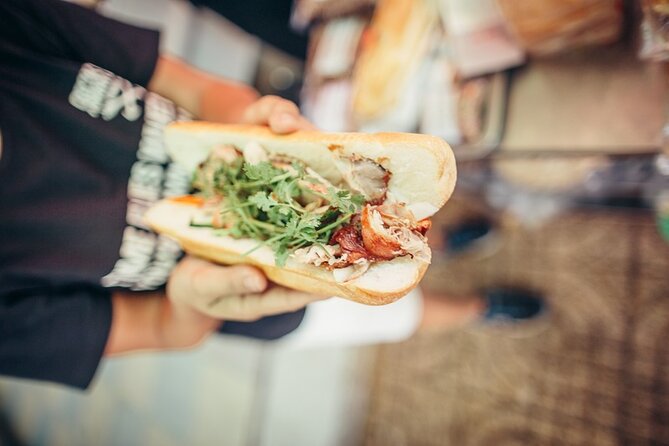 Ho Chi Minh City by Night: Ultimate Street Food Experience With 5 Food Stops - Sampling Vietnamese Specialties