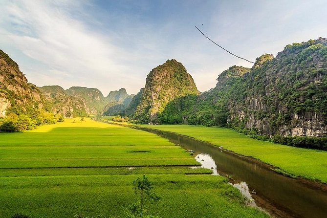 Hoa Lu - Tam Coc Full Day Tour: Boating; Biking, Buffet Lunch - Boat Trip in Tam Coc