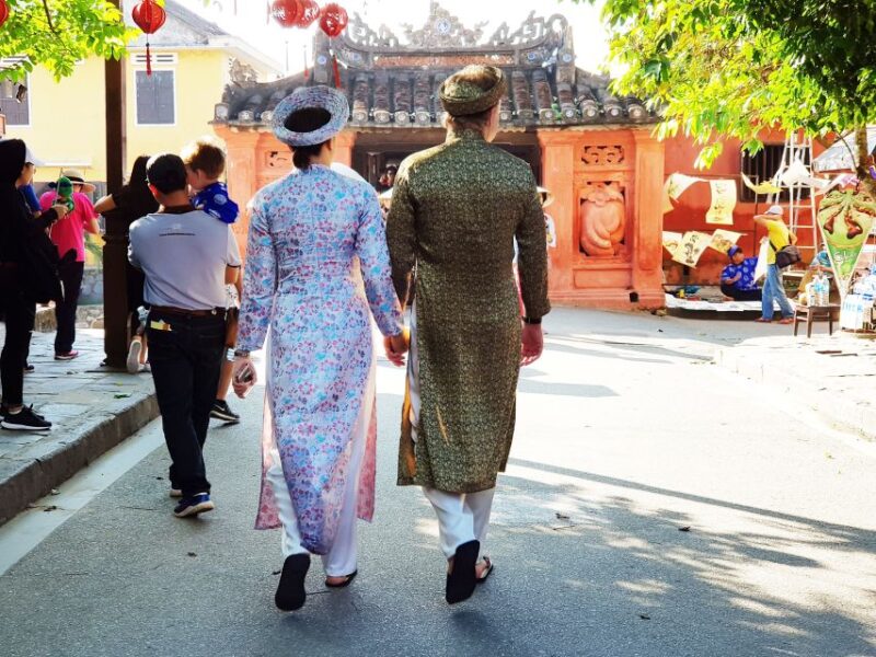 Hoi An Cyclo Tour in Vietnamese Traditional Ao Dai - Donning the Elegant Vietnamese Ao Dai