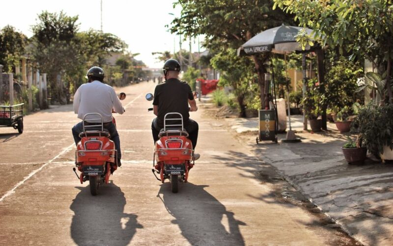 Hoi An Evening Foodie Tour By Electric Scooter - Madam Khanhs Banh Mi