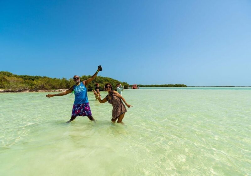 Holbox: Guided Visit to the Island, Cenote Swim and Lunch - Itinerary Highlights