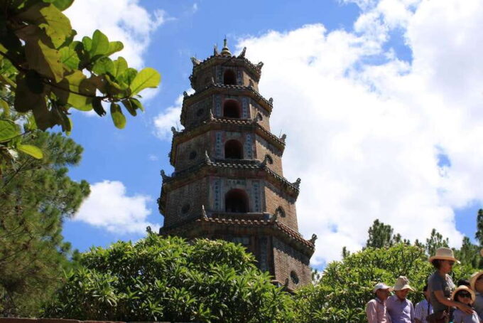 Hue: Half-Day City Tour With Dragon Boat Cruise & Car - Exploring the Imperial Citadel and Dong Ba Market
