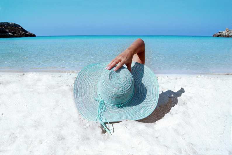 Ibiza: Boat Trip to Formentera With Open Bar and Paella - Itinerary and Activities