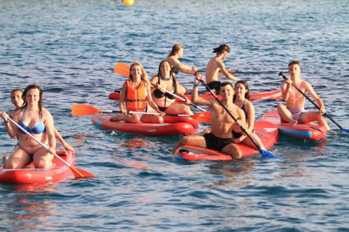 Ibiza by Sea: Coves, Caves, Water Sports & Open Bar - Setting Sail on the Ibiza Adventure