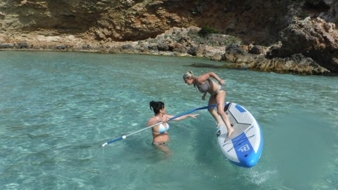 Ibiza: Cave and Beach Hopping Private Boat Tour - Bask in Cala Conta