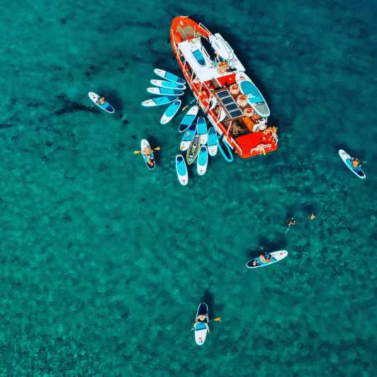 Ibiza: Secret Coves Guided Boat Tour With Open Bar and Tapas - Boat Capacity and Languages