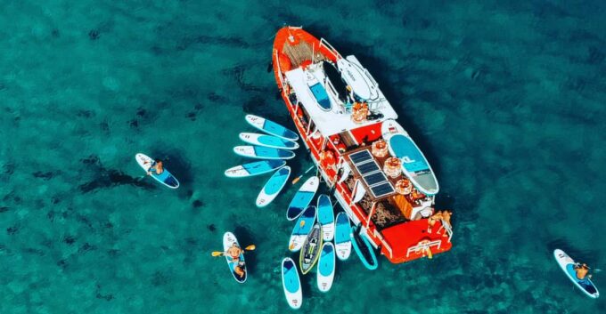 Ibiza: Secret Coves Guided Boat Tour With Open Bar and Tapas - Culinary Offerings