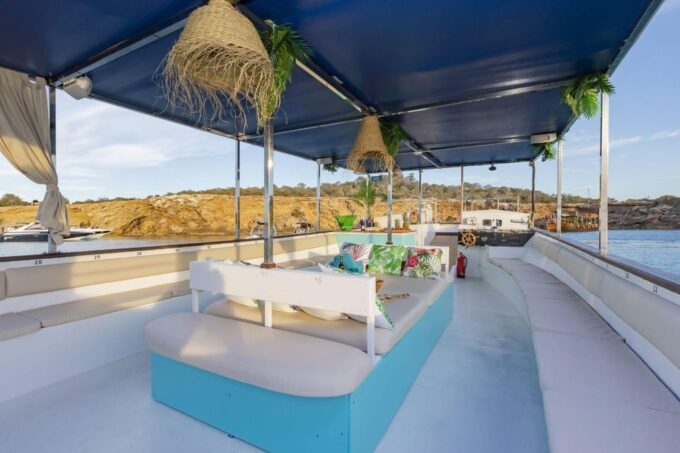 Ibiza: Sunset Boat Tour With Water Sports, Open Bar & Tapas - Booking and Cancellation