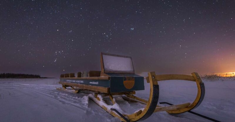 Ii: Snowmobile Sleigh Trip on Frozen Sea Under Starlit Sky - Activity Overview