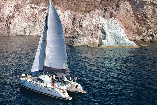 Infinity Blue Semi Private Daytime Cruise With Meal in Santorini - Pricing and Capacity