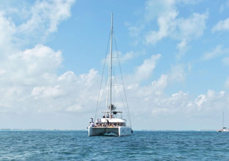 Isla Mujeres: Catamaran Tour, Snorkel, Buffet and Open Bar - Snorkeling at Coral Reef