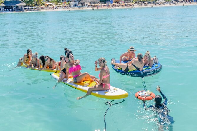 Isla Mujeres Catamaran Tour With Snorkel, Open Bar and Transport - Restrictions and Warnings Noted