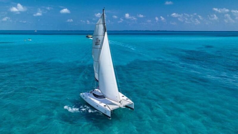 Isla Mujeres Catamaran Tour With Snorkeling & Beach Club - Key Points
